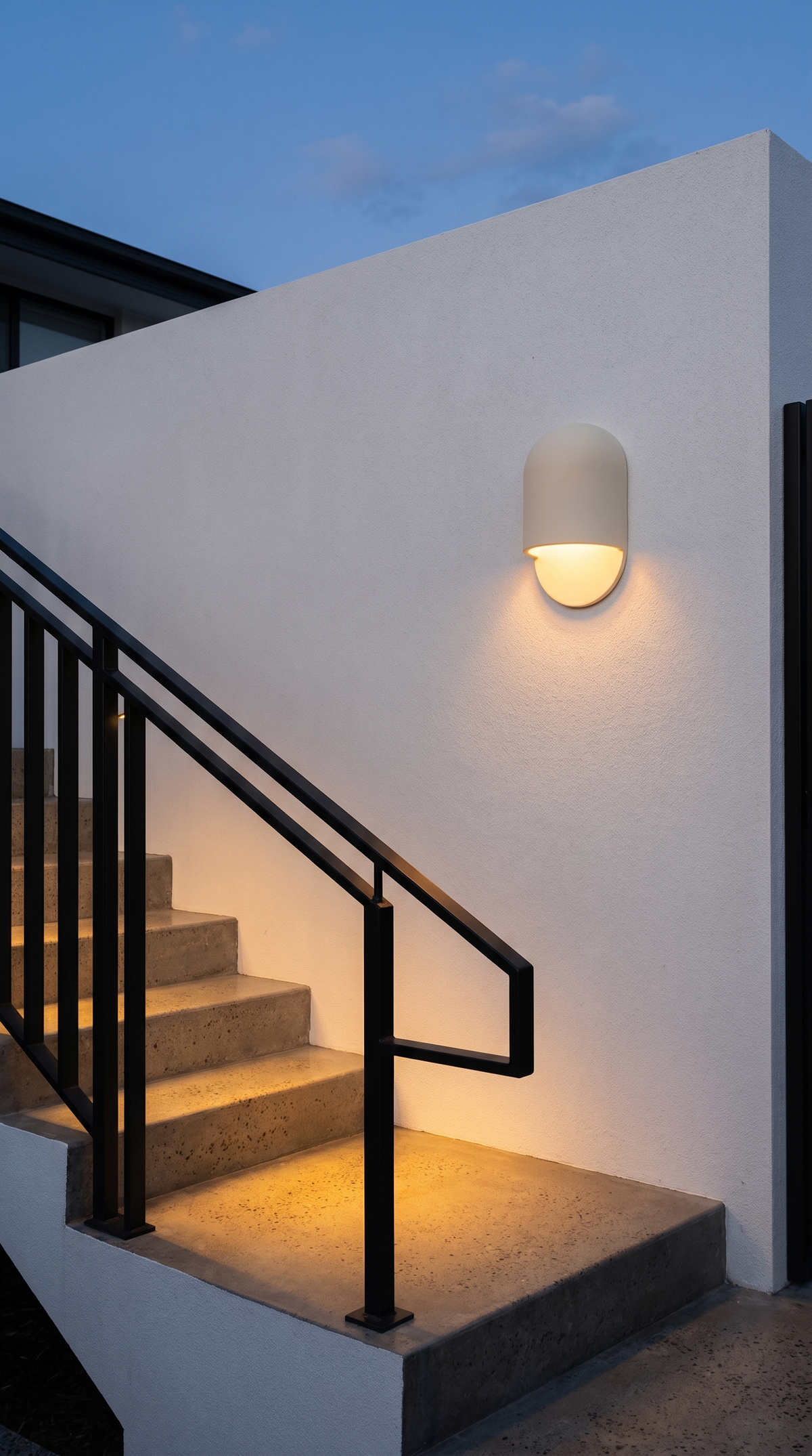 AX472 outdoor wall sconce lighting exterior concrete stairs with a black metal handrail
