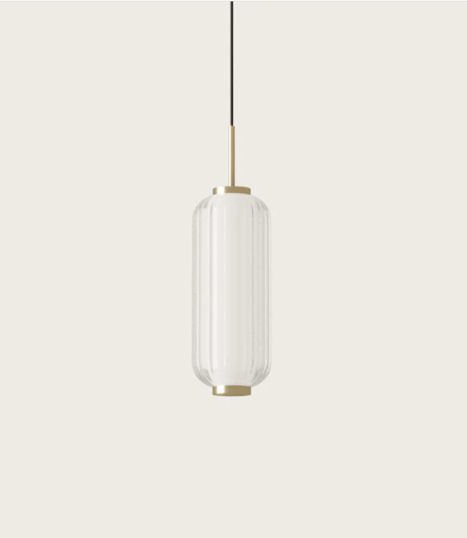 Pendant light with ribbed glass shade on a neutral background