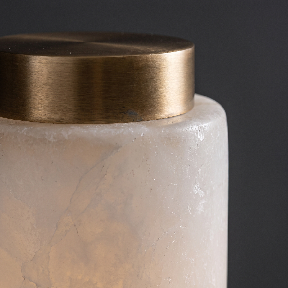 Natural alabaster stone texture and brass cap on the AX290 luxury alabaster sconce